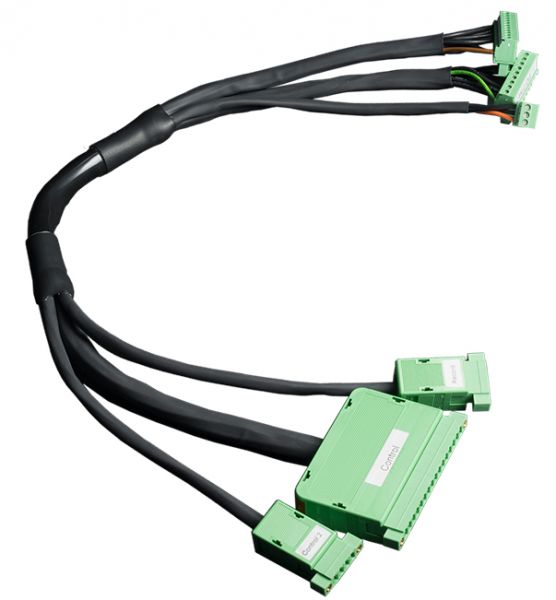 An electrical wiring harness, the PHOENIX IO Adapter L300i by Leybold North America, features multiple black cables converging into a green connector hub. The hub incorporates various green connectors branching out, each labeled for organization. Its compact and functional design reflects the complexity of the wiring system.